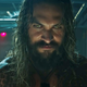 Jason Momoa’s Arthur Curry is all smiles, and with good reason.